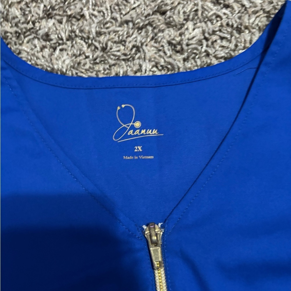 Jaanuu Women's Blue Zip-Front Scrub - Picture 6 of 9